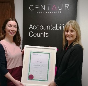 karen_is_pictured_receiving_her_certificate_from_jean_ryan_from_the_cpa_institute
